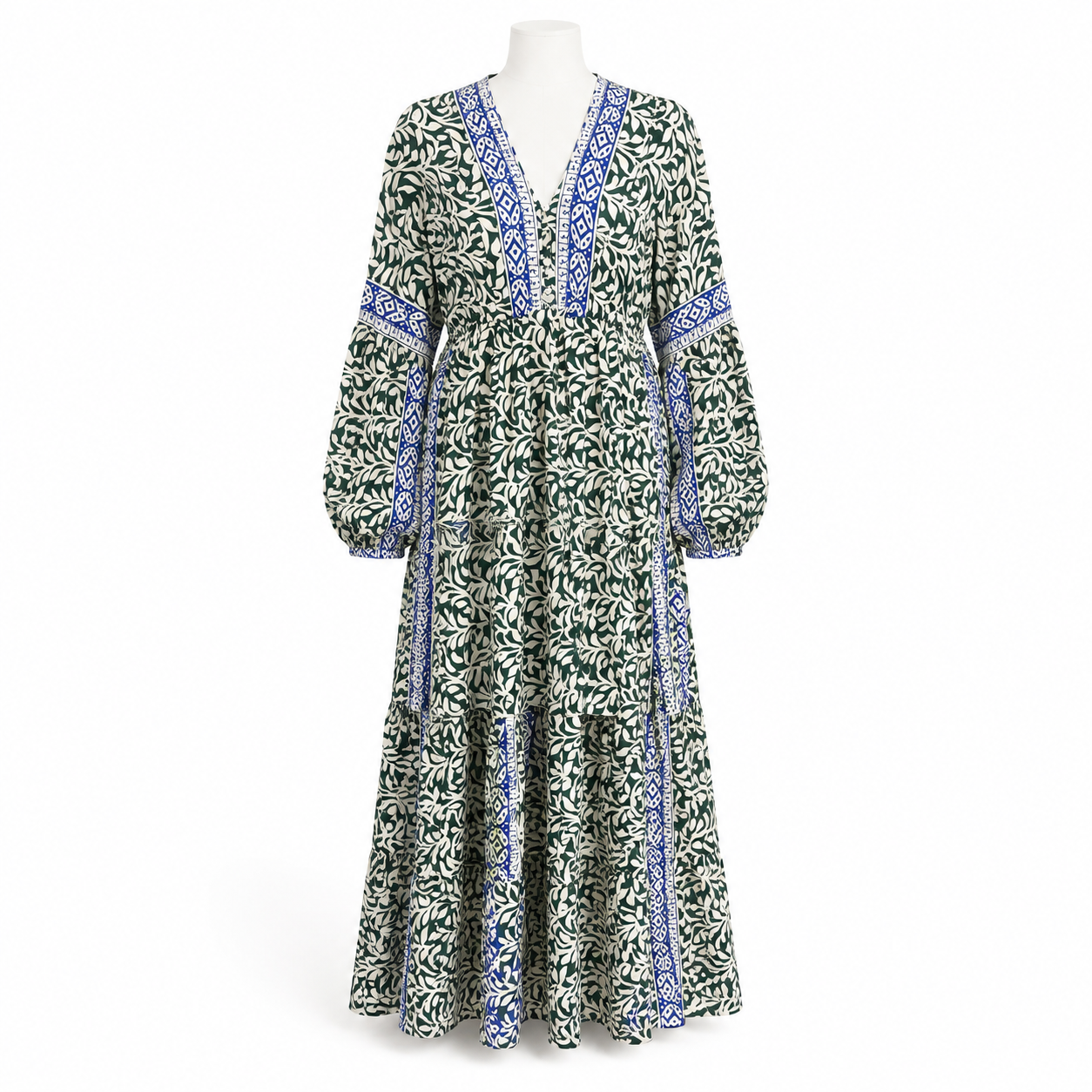 Style 10606 long green and blue printed dress on a white mannequin