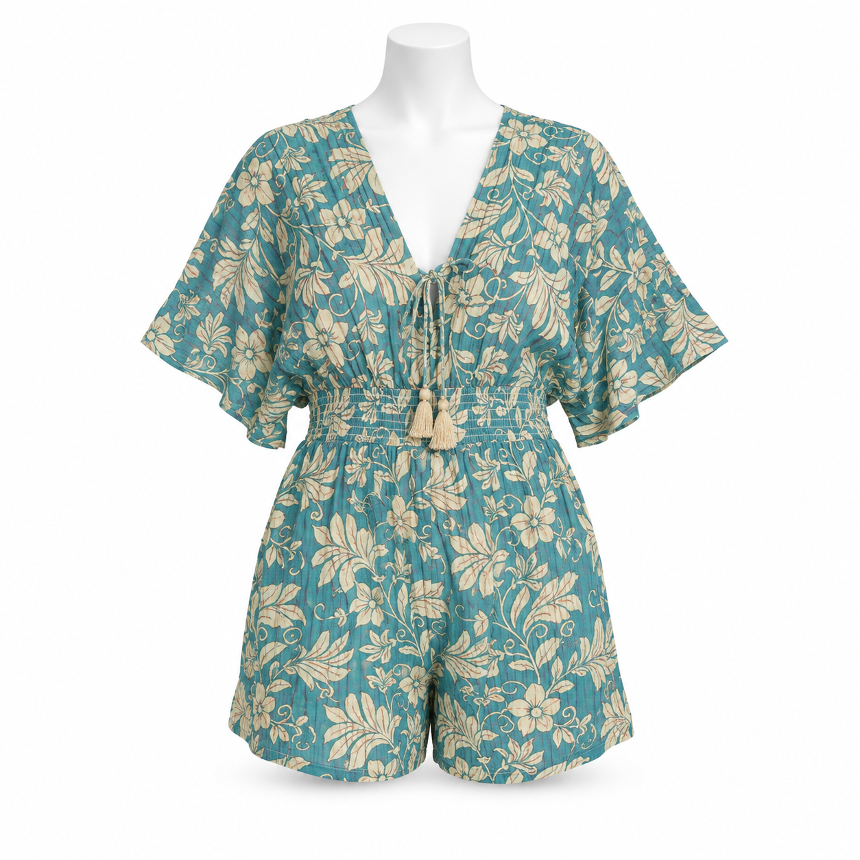 Style 11240 teal and cream short romper on a white mannequin