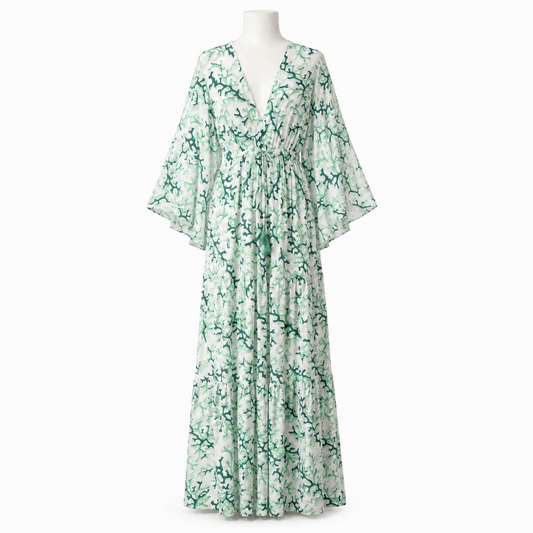 Style Z-199 long green printed dress with loose flowy sleeves on a white mannequin